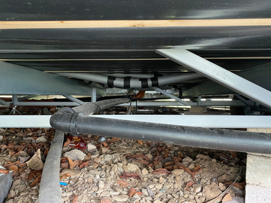 pipes underneath a static caravan